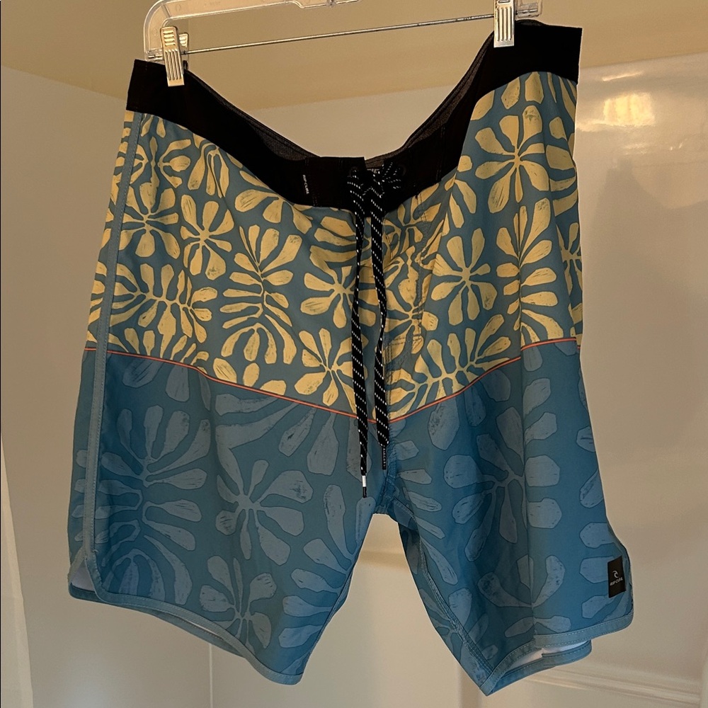 5/$20 Rip Curl Blue and Cream Floral Board Shorts